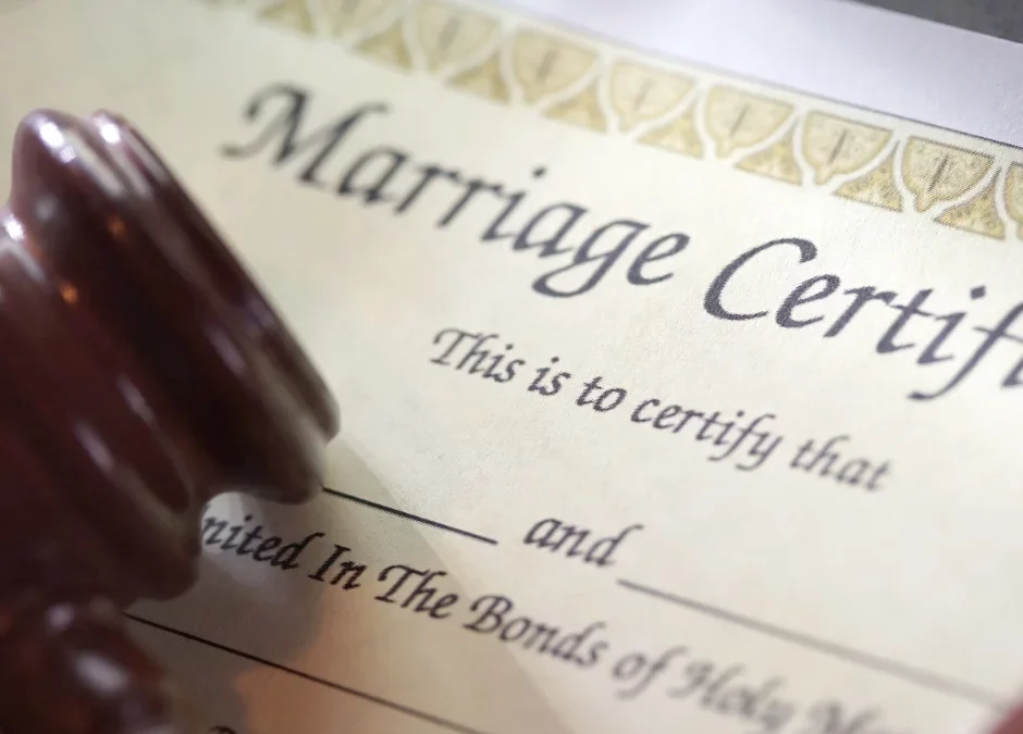 A marriage certificate on a lawyers desk