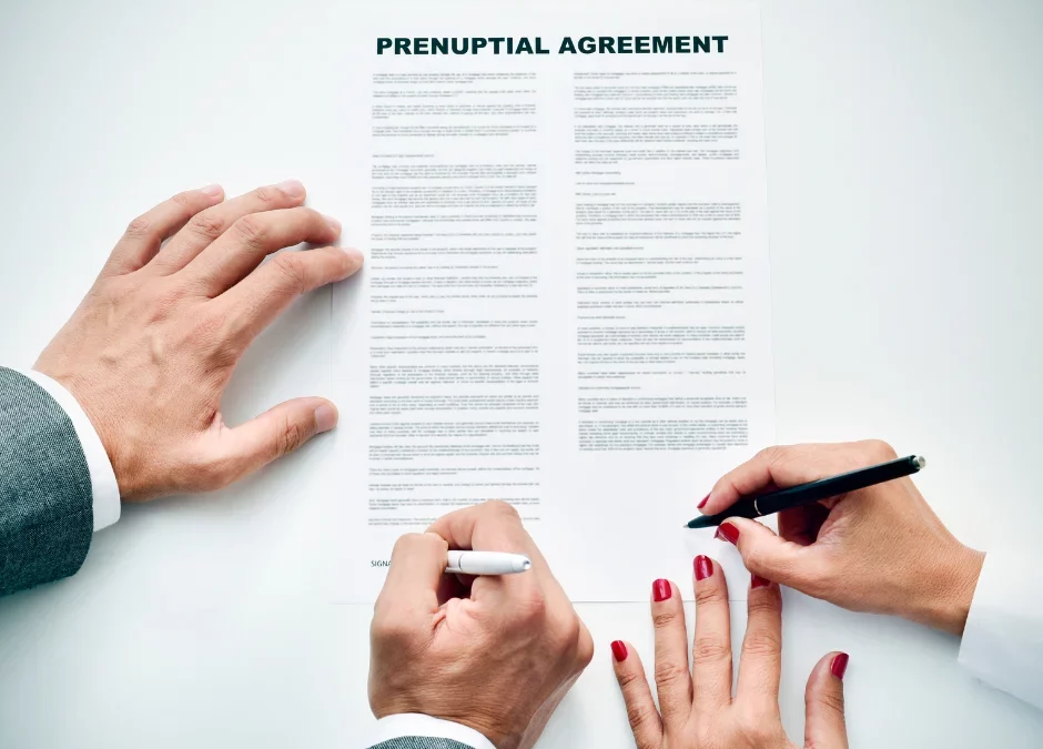 A couple signing a prenuptial agreement in Ontario